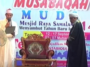 Teungku Dokter Bacakan Isi Bai'ah Pelantikan Pengurus dan Dewan Guru LPI MUDI Masjid Raya Samalanga