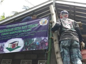 Tingkatkan Silaturrahim, PSHT Cabang Malang Gelar Baksos Bedah Rumah