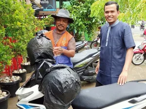 Juru Parkir Yang Kaya Hati